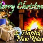 A Christmas scene with a fireplace in a blurred background and the words "Mary Christmas and Happy New Year!" superimposed on it
