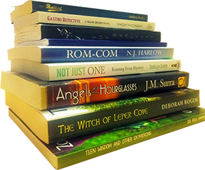 Stack of printed books formatted by Erika Q. Stokes